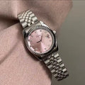 women watch Scottie 9570